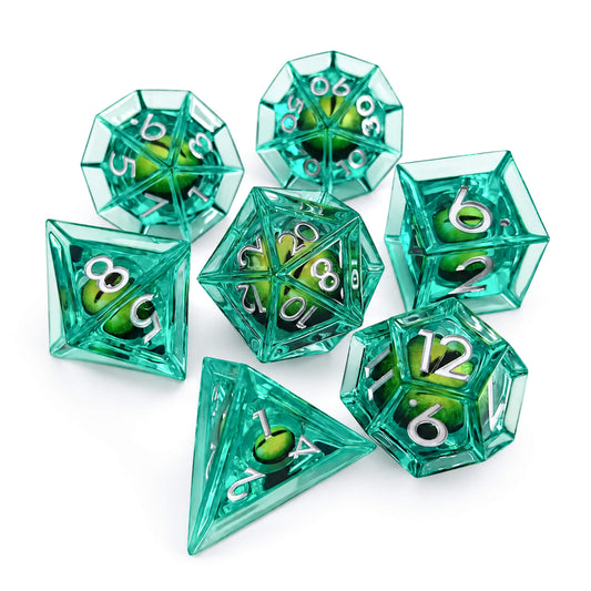 Emerald Dragon Eye 7-piece green liquid core DND dice set with green dragon eyes and silver numbers on white background.