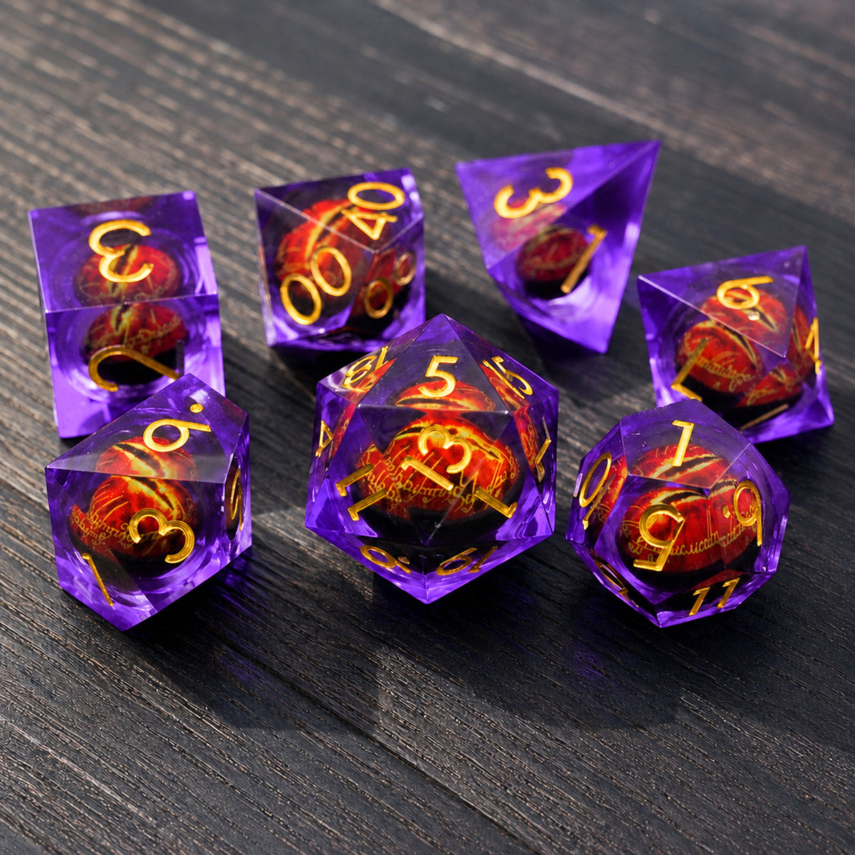 Amethyst Flame Dragon Eye 7-piece violet liquid core DND dice set with red dragon eyes and gold numbers on a dark wood tabletop.