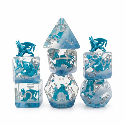 Azure Dragonling 7-piece clear resin embedded DND dice set with blue dragon figures on white background.