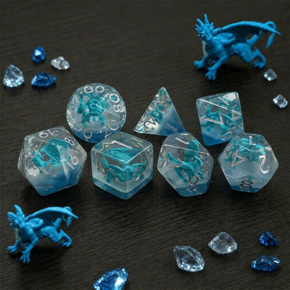 Azure Dragonling 7-piece resin DND dice set with blue dragon figures, crystals, and dragon figurines.