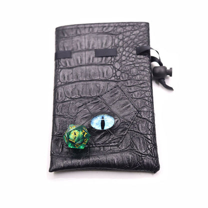 Azure Eye black textured drawstring DND dice bag with blue dragon eye and green D20 die on white background.