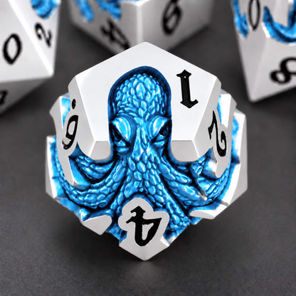 Cold Current Kraken silver-tone metal D12 featuring a blue pearlescent kraken design and black numbers on a dark background.