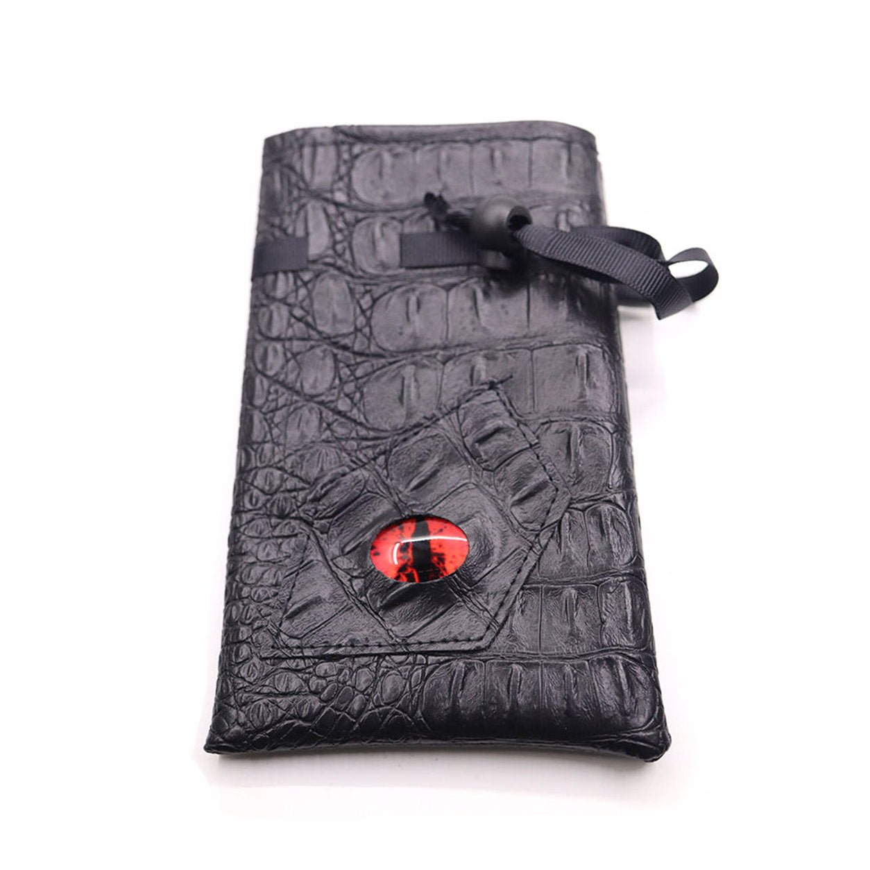 Crimson Eye black textured drawstring DND dice bag with red dragon eye design laid flat on white background.