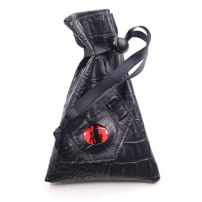 Crimson Eye black textured drawstring DND dice bag with drawstring pulled tight and red dragon eye on white background.