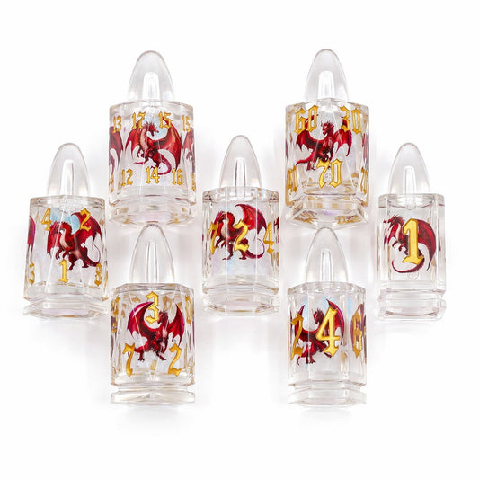 Midnight Assassin 7-piece black bullet-shaped liquid core DND dice set with iridescent flakes and silver numbers on white background.