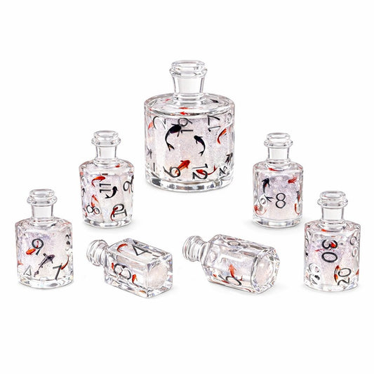 Fortune Koi 7-piece clear resin liquid core DND dice set with koi motifs on white background.