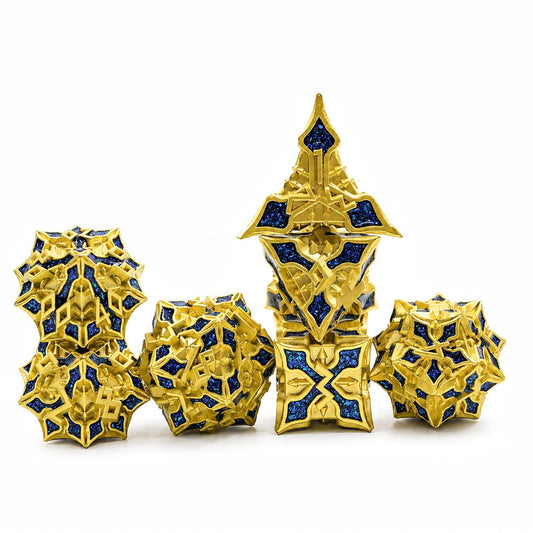 Golden Knight Series 7-piece gold-toned metal DND dice set with blue glitter inlays on white background.