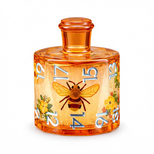 Honeyed Vial single D20 amber resin liquid core DND die with bee and flower motifs on white background.