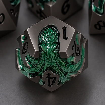 Kelpbound Kraken gunmetal D12 with glossy deep green kraken design and black numbers.