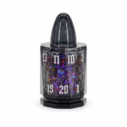 Midnight Assassin single D20 black bullet-shaped liquid core DND die with iridescent flakes on white background.