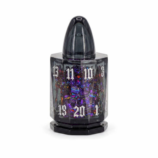 Midnight Assassin single D20 black bullet-shaped liquid core DND die with iridescent flakes on white background.