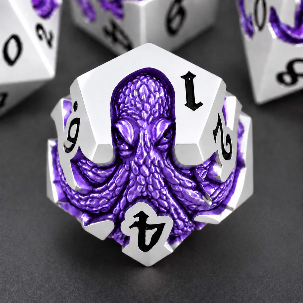 Moonveil Kraken silver-tone metal D12 featuring a purple pearlescent kraken design and black numbers on a dark background.