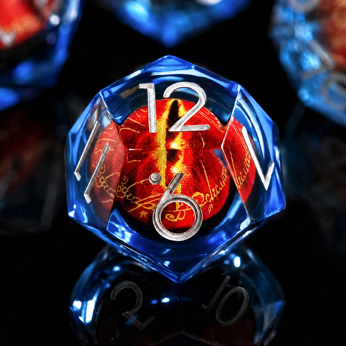 Sapphire Flame Dragon Eye close-up of a blue liquid core DND die with red dragon eye and silver numbers on a black reflective surface.