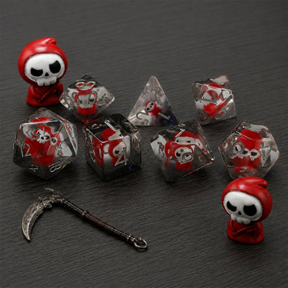 Scarlet Reaper 7-piece resin DND dice set with red reaper figures, grim figurines, and a small scythe.