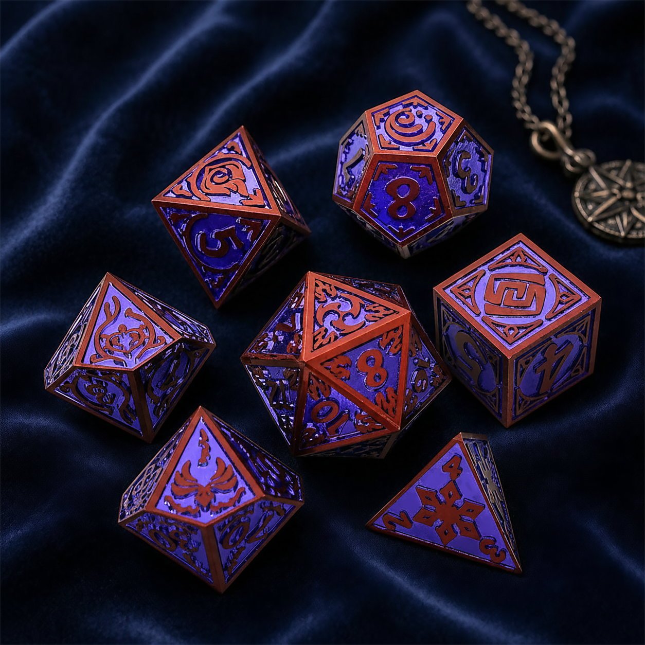 Starseer Oracle 7-piece metal DND dice set on deep blue velvet with a pendant for a mystical scene.
