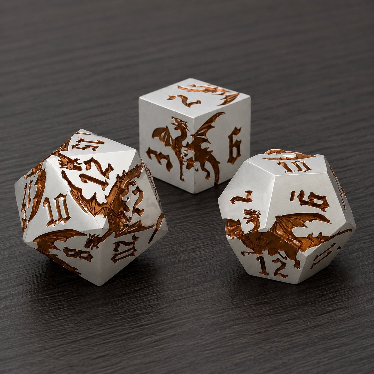 Steampunk Dragon close-up of three silver-white metal DND dice with bronze dragon engravings on a dark wood tabletop.