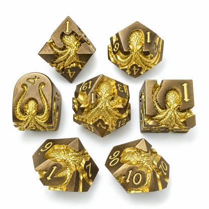 Sunken Crown Kraken 7-piece gold metal DND dice set with bright gold kraken designs on a white background.