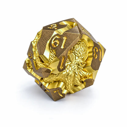 Sunken Crown Kraken gold metal D20 with a bright gold kraken design and engraved numbers on a white background.