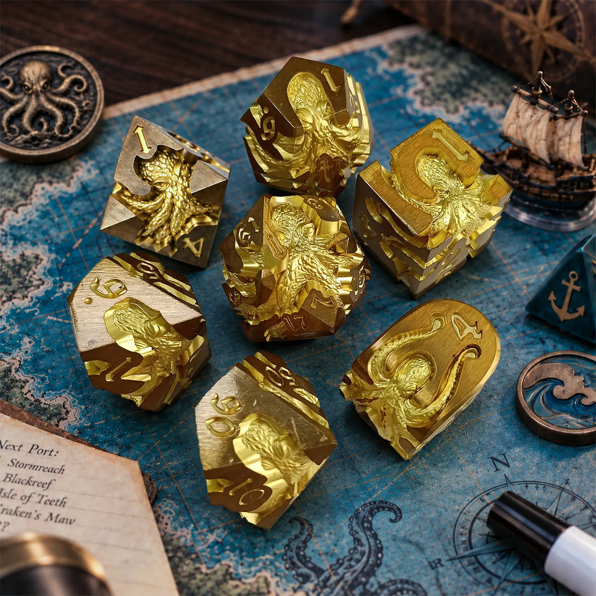 Sunken Crown Kraken 7-piece gold metal dice set with bright gold kraken designs in a nautical adventure game scene.